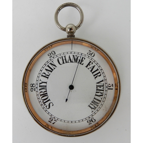 697 - A WHITE METAL CASED BAROMETER