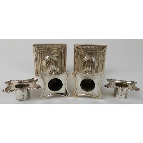 699 - A PAIR OF LATE VICTORIAN SILVER CANDLESTICKS