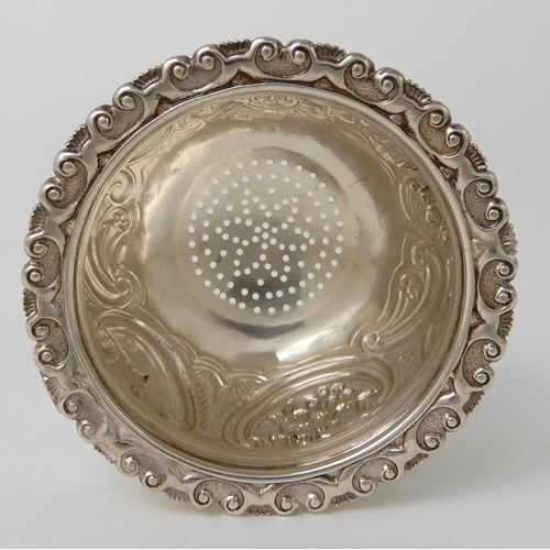 707 - A SILVER WINE STRAINER