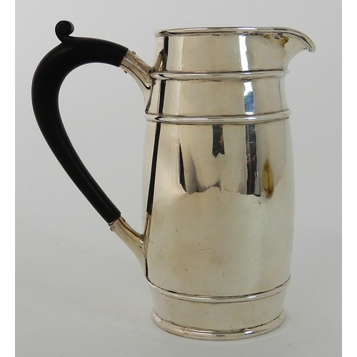 709 - A SILVER WATER JUG