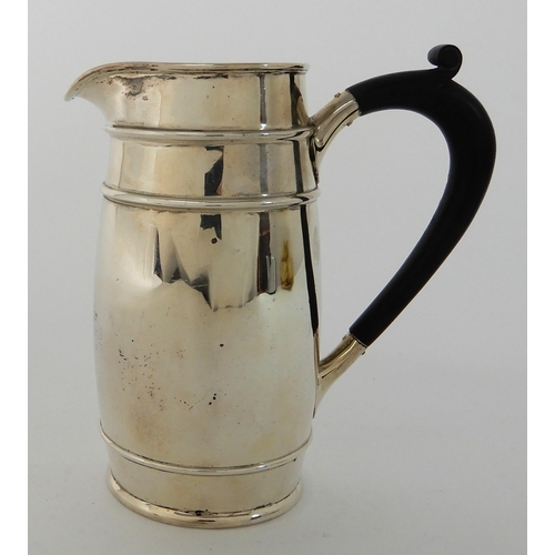 709 - A SILVER WATER JUG