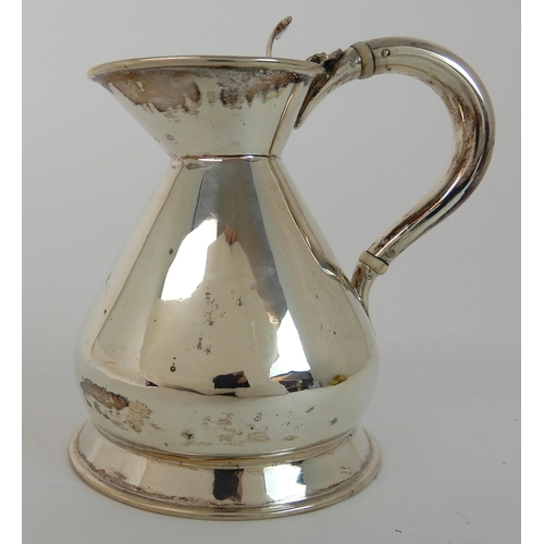 710 - A SILVER HOT WATER JUG