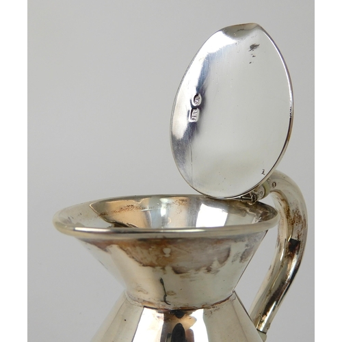 710 - A SILVER HOT WATER JUG