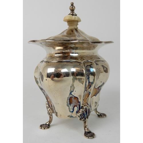 711 - A SILVER TEA CADDY