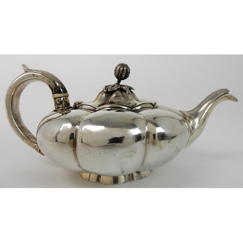 713 - A SILVER TEAPOT