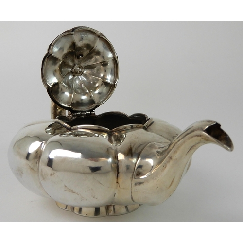 713 - A SILVER TEAPOT