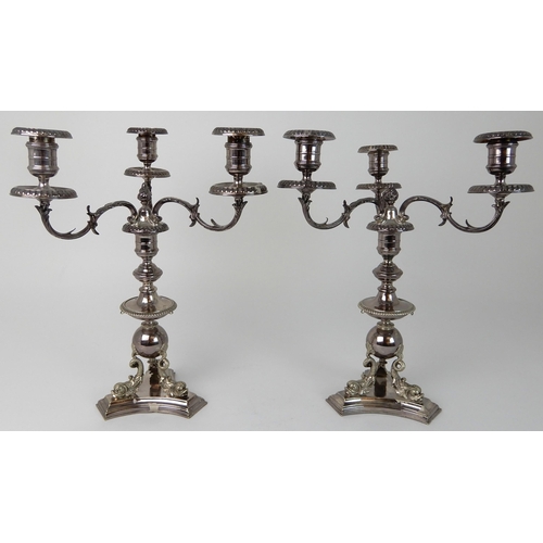 724 - A PAIR OF SILVER PLATED CENTREPIECE THREE-LIGHT CANDELABRA