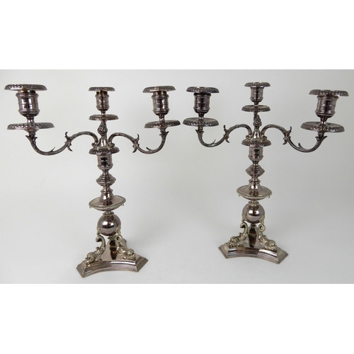 724 - A PAIR OF SILVER PLATED CENTREPIECE THREE-LIGHT CANDELABRA