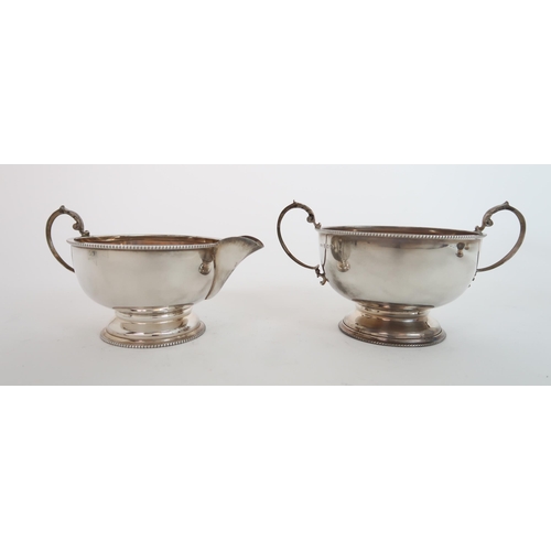 727 - A FOUR PIECE SILVER TEA SERVICE