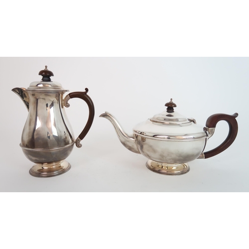 727 - A FOUR PIECE SILVER TEA SERVICE