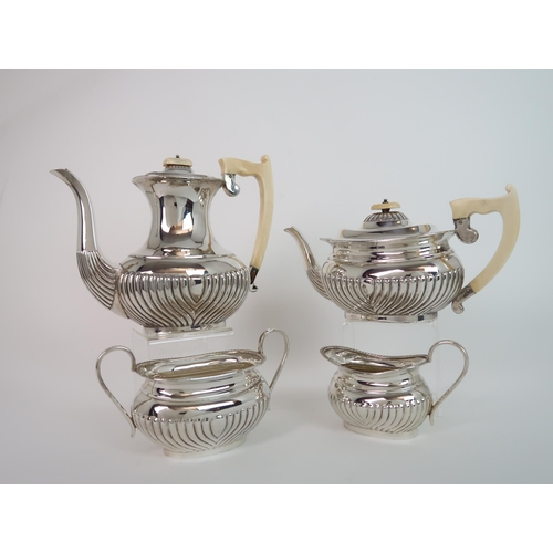 743 - A FOUR PIECE SILVER TEA SERVICE