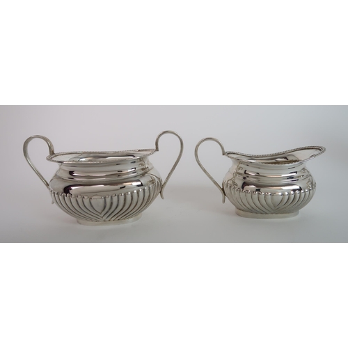 743 - A FOUR PIECE SILVER TEA SERVICE