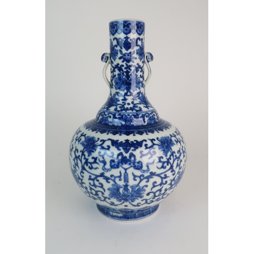 183 - A CHINESE BLUE AND WHITE BALUSTER VASE