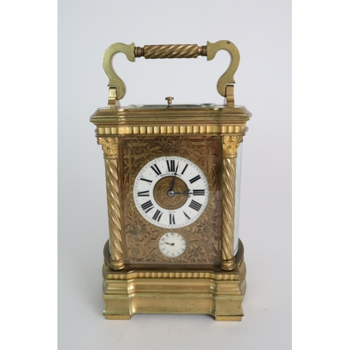 278 - A HARMANN AND KOCH GLASS AND BRASS CARRIAGE ALARM CLOCK