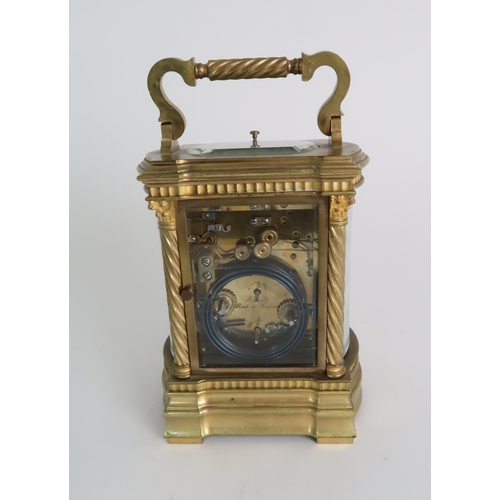 278 - A HARMANN AND KOCH GLASS AND BRASS CARRIAGE ALARM CLOCK