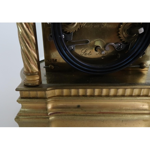 278 - A HARMANN AND KOCH GLASS AND BRASS CARRIAGE ALARM CLOCK