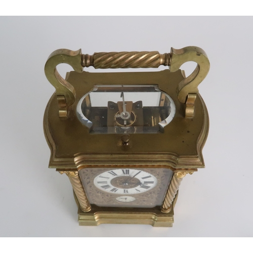 278 - A HARMANN AND KOCH GLASS AND BRASS CARRIAGE ALARM CLOCK