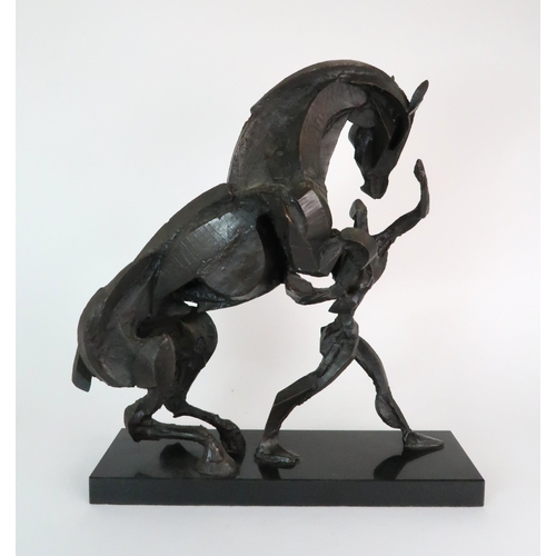 279 - SOPHIE DICKENS (BRITISH B. 1966) A STYLISED BRONZE SCULPTURE OF A REARING HORSE AND FIGURE