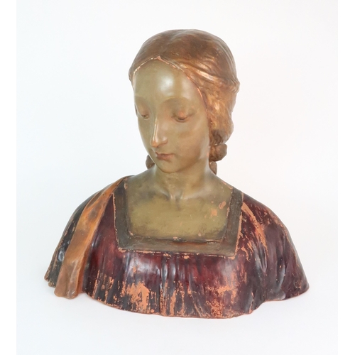 310 - A PAINTED TERRACOTTA BUST OF A WOMAN