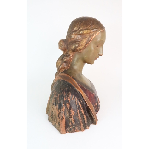 310 - A PAINTED TERRACOTTA BUST OF A WOMAN