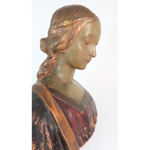 310 - A PAINTED TERRACOTTA BUST OF A WOMAN