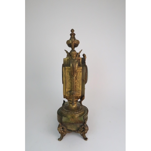 337 - A FRENCH ONYX AND ORMOLU MOUNTED MANTLE CLOCK