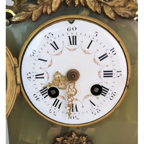 337 - A FRENCH ONYX AND ORMOLU MOUNTED MANTLE CLOCK