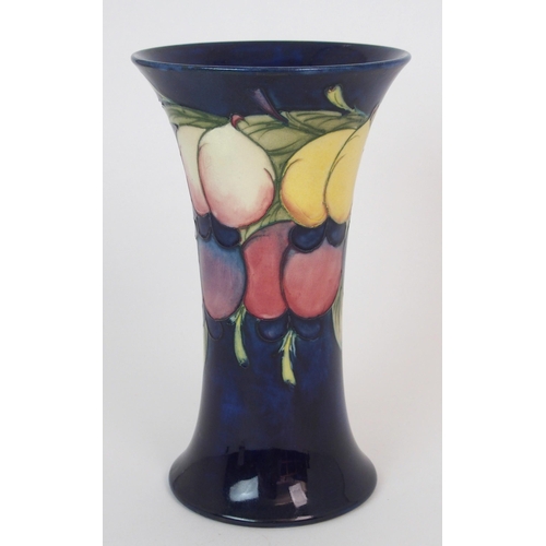 339 - A MOORCROFT WISTERIA PATTERN VASE