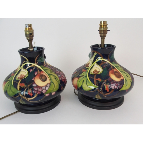 341 - A PAIR OF MOORCROFT QUEENS CHOICE TABLE LAMPS