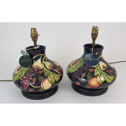 341 - A PAIR OF MOORCROFT QUEENS CHOICE TABLE LAMPS