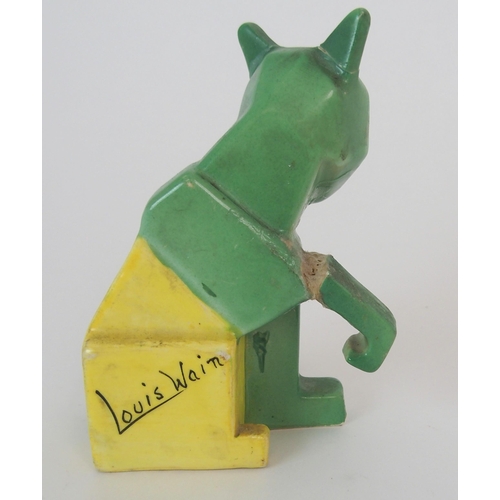 343 - A RARE LOUIS WAIN POTTERY MODEL OF A CAT