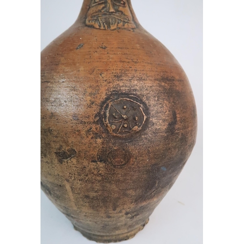 358 - A 17TH CENTURY BELLARMINE STONEWARE JUG