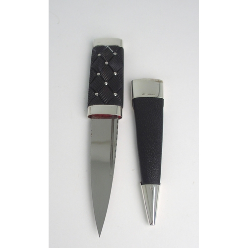 414 - A SILVER-MOUNTED SGIAN DUBH BY HAMILTON & INCHES