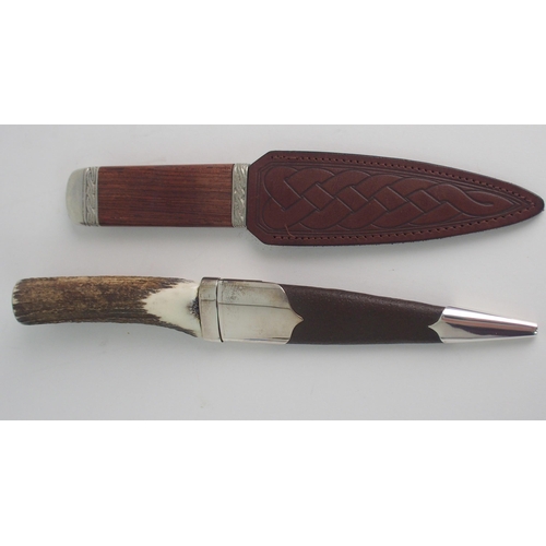 415 - A SILVER-MOUNTED SGIAN DUBH BY HAMILTON & INCHES