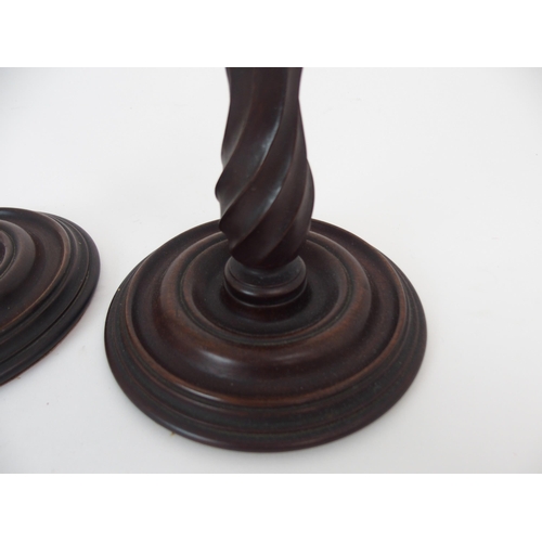 431 - A PAIR OF MAHOGANY AND BRASS MOUNTED CANDLE STICKS