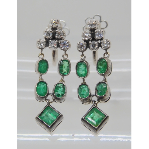 523 - A PAIR OF EMERALD AND DIAMOND DROP EARRINGS