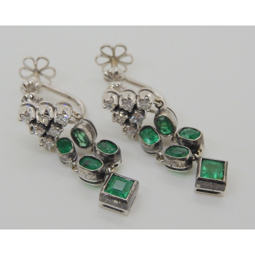 523 - A PAIR OF EMERALD AND DIAMOND DROP EARRINGS