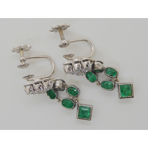 523 - A PAIR OF EMERALD AND DIAMOND DROP EARRINGS