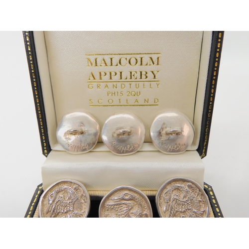 525 - TWELVE MALCOLM APPLEBY SILVER DUCK BUTTONS