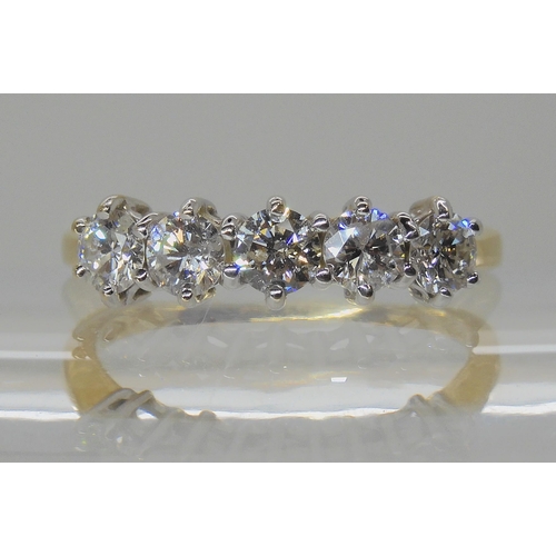 532 - AN 18CT GOLD FIVE STONE DIAMOND RING