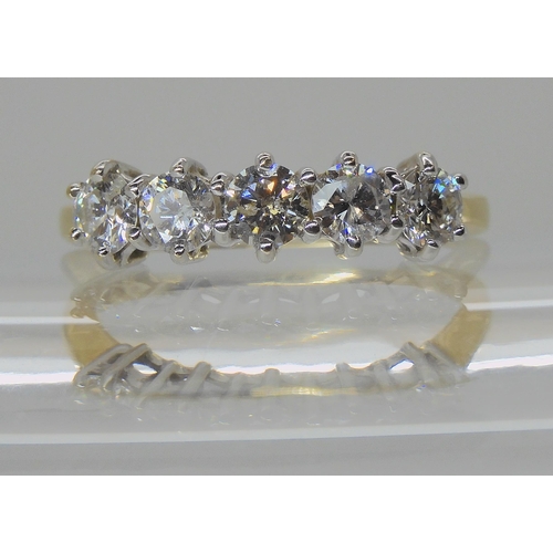 532 - AN 18CT GOLD FIVE STONE DIAMOND RING