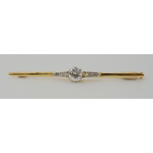 538 - A YELLOW METAL DIAMOND BAR BROOCH