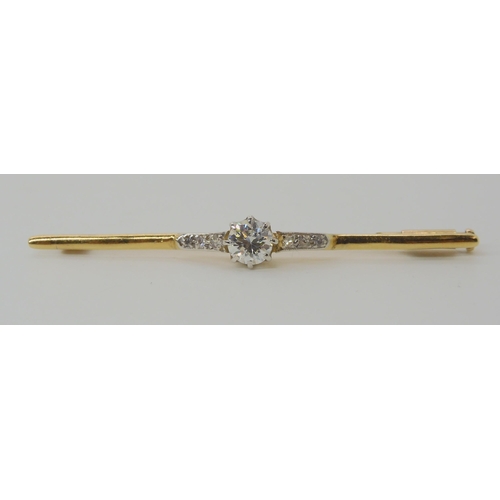 538 - A YELLOW METAL DIAMOND BAR BROOCH