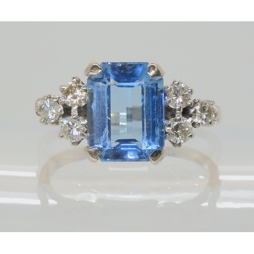 547 - AN 18CT WHITE GOLD AQUAMARINE AND DIAMOND RING