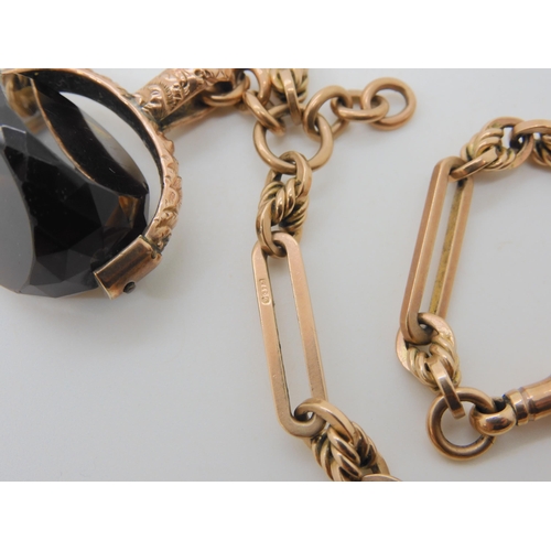 559 - A 9CT ROSE GOLD FANCY FOB CHAIN & SEAL