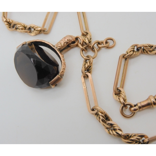 559 - A 9CT ROSE GOLD FANCY FOB CHAIN & SEAL