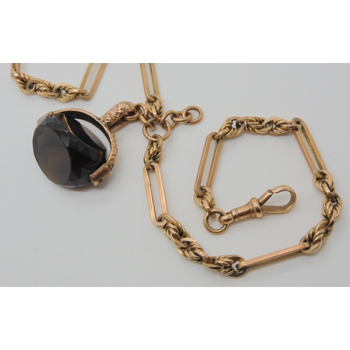 559 - A 9CT ROSE GOLD FANCY FOB CHAIN & SEAL