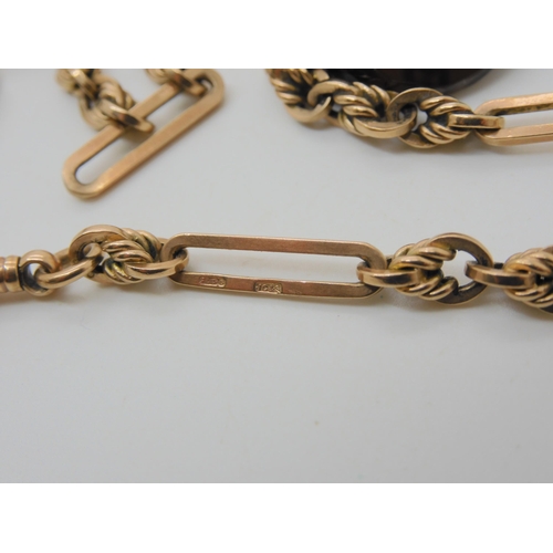 559 - A 9CT ROSE GOLD FANCY FOB CHAIN & SEAL