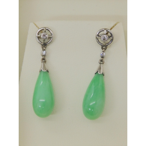 571 - A PAIR OF CHINESE GREEN HARDSTONE AND DIAMOND DROP EARRINGS