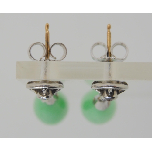 571 - A PAIR OF CHINESE GREEN HARDSTONE AND DIAMOND DROP EARRINGS